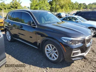 2022 BMW X5 xDrive45e with VIN 5UXTA6C01N9H53033, listed as a Copart auction lot 71154564 with 23,269 mi miles and Salvage Title. Bid and sale history available at carsss.com. Image 4.