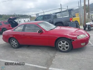 1996 Lexus SC 300 z VIN JT8CD32Z3T0034600, wystawiony jako IAAI lot #42106378 z przebiegiem 163 126 mil mil oraz . Historia ofert i sprzedaży dostępna na DreamBid. Obrazek 13.
