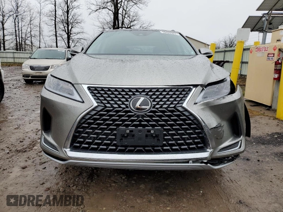 2022 Lexus RX with VIN 2T2HZMDA4NC321485, listed as a Copart auction lot 70409922 with 8,963 mi miles. Bid and sale history available at carsss.com. Image 5.