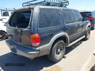 1999 Ford Explorer z VIN 1FMZU32X6XZA93597, wystawiony jako IAAI lot #42138855 z przebiegiem 190 449 mil mil oraz . Historia ofert i sprzedaży dostępna na DreamBid. Obrazek 4.