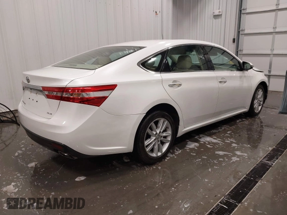 2014 Toyota Avalon Limited with VIN 4T1BK1EB1EU088538, listed as a IAAI auction lot 41793990 with 75,244 mi miles. Bid and sale history available at carsss.com. Image 4.