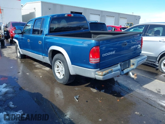 2003 Dodge Dakota SLT with VIN 1D7HL48N73S333828, listed as a IAAI auction lot 41748642 with 163,258 mi miles. Bid and sale history available at carsss.com. Image 3.