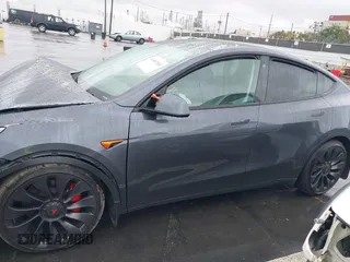 2023 Tesla Model Y Performance with VIN 7SAYGDEF0PF774282, listed as a IAAI auction lot 41807031 with Not Provided miles and . Bid and sale history available at DreamBid. Image 13.