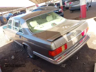 1990 Mercedes-Benz 560 with VIN WDBCA39E7LA505668, listed as a IAAI auction lot 41473380 with 159,716 mi miles and . Bid and sale history available at DreamBid. Image 3.