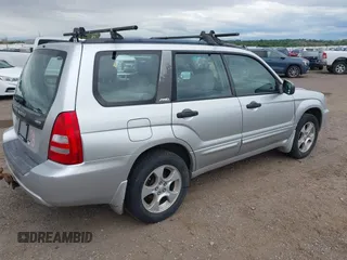 2003 Subaru Forester XS with VIN JF1SG65633G771008, listed as a IAAI auction lot 42451868 with 202,915 mi miles and . Bid and sale history available at DreamBid. Image 4.