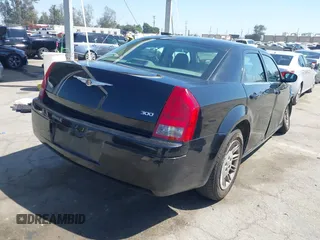 2007 Chrysler 300 with VIN 2C3KA43R97H889656, listed as a IAAI auction lot 41982493 with 81,607 mi miles. Bid and sale history available at carsss.com. Image 4.