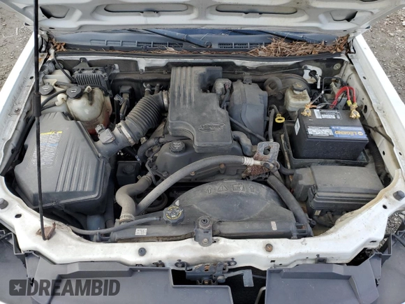 2006 Chevrolet Colorado LS z VIN 1GCCS148068287038, wystawiony jako Copart lot #42262165 z przebiegiem 185 037 mil mil oraz Szkoda całkowita • Salvage title. Historia ofert i sprzedaży dostępna na DreamBid. Obrazek 12.