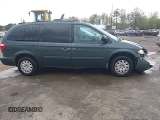 2006 Chrysler Town & Country LX with VIN 2A4GP44R96R615942, listed as a IAAI auction lot 42039452 with 158,009 mi miles and . Bid and sale history available at DreamBid. Image 13.