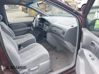 1999 Toyota Sienna LE with VIN 4T3ZF13C7XU152879, listed as a IAAI auction lot 41974953 with 201,644 mi miles. Bid and sale history available at carsss.com. Image 5.