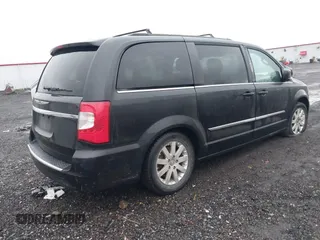 2015 Chrysler Town & Country Touring with VIN 2C4RC1BG1FR534220, listed as a IAAI auction lot 41489371 with 136,923 mi miles. Bid and sale history available at carsss.com. Image 4.