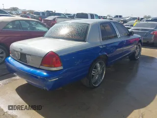1999 Ford Crown Victoria Police with VIN 2FAFP71W5XX192230, listed as a IAAI auction lot 41629743 with 170,510 mi miles. Bid and sale history available at carsss.com. Image 4.