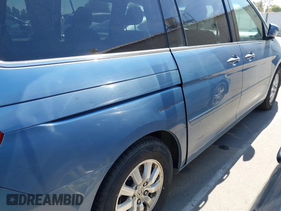 2010 Honda Odyssey EX-L with VIN 5FNRL3H64AB071603, listed as a IAAI auction lot 42084026 with 199,753 mi miles. Bid and sale history available at carsss.com. Image 12.