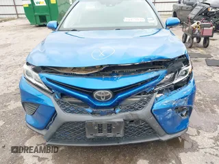 2019 Toyota Camry LE z VIN 4T1B11HK6KU217769, wystawiony jako IAAI lot #41900518 z przebiegiem 104 604 mil mil oraz . Historia ofert i sprzedaży dostępna na DreamBid. Obrazek 12.