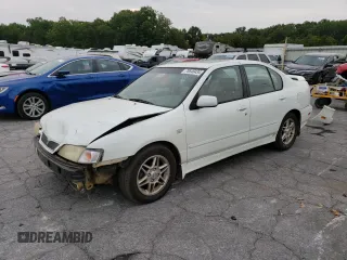 2002 Infiniti G20 Luxury with VIN JNKCP11AX2T500141, listed as a Copart auction lot 70648434 with 196,559 mi miles and Salvage Title. Bid and sale history available at DreamBid. Image 1.
