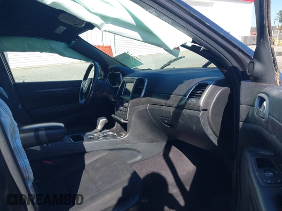 2018 Jeep Grand Cherokee Laredo E with VIN 1C4RJFAG8JC335459, listed as a IAAI auction lot 41850163 with 93,289 mi miles. Bid and sale history available at carsss.com. Image 5.