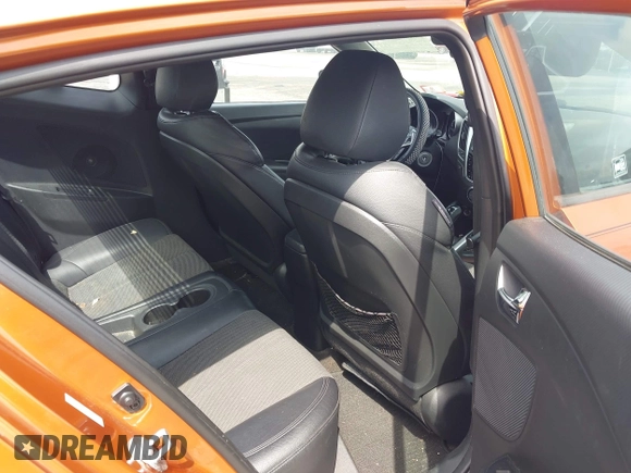 2013 Hyundai Veloster w/Black Int z VIN KMHTC6AD4DU169568, wystawiony jako IAAI lot #42483730 z przebiegiem 214 625 mil mil oraz . Historia ofert i sprzedaży dostępna na DreamBid. Obrazek 8.