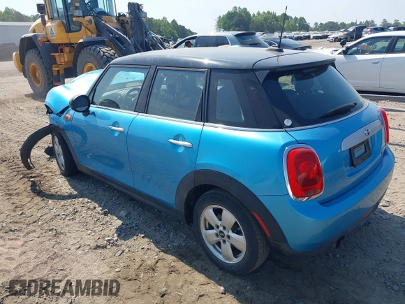 2015 MINI Hardtop 4 Door with VIN WMWXS5C56FT831505, listed as a IAAI auction lot 42155398 with 95,693 mi miles and . Bid and sale history available at DreamBid. Image 3.