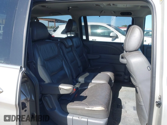 2005 Honda Odyssey EX-L with VIN 5FNRL38705B008884, listed as a IAAI auction lot 42081384 with 219,336 mi miles. Bid and sale history available at carsss.com. Image 8.