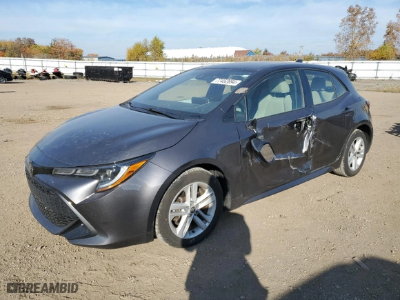 2022 Toyota Corolla Hatchback SE with VIN JTND4MBE1N3158709, listed as a Copart auction lot 77452694 with 74,299 mi miles and Salvage Title. Bid and sale history available at carsss.com. Image 1.
