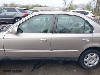 2000 Honda Civic EX with VIN 1HGEJ8643YL000579, listed as a IAAI auction lot 41947054 with 144,508 mi miles. Bid and sale history available at carsss.com. Image 14.
