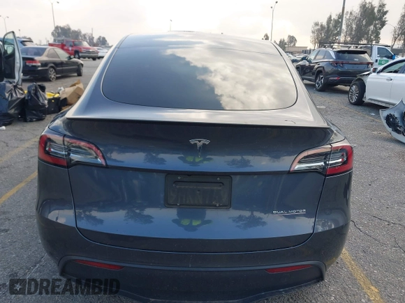 2023 Tesla Model Y Performance with VIN 7SAYGDEF6PF837174, listed as a IAAI auction lot 41436629 with 22,799 mi miles and . Bid and sale history available at DreamBid. Image 17.