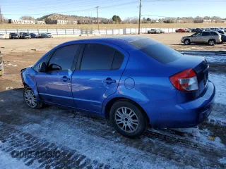 2013 Suzuki SX4 LE with VIN JS2YC5A38D6101442, listed as a Copart auction lot 42833395 with 154,379 mi miles and Salvage Title. Bid and sale history available at carsss.com. Image 2.
