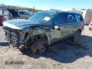 2023 Chevrolet Tahoe LS with VIN 1GNSCMKD5PR444303, listed as a IAAI auction lot 41260372 with 13,180 mi miles and . Bid and sale history available at DreamBid. Image 2.