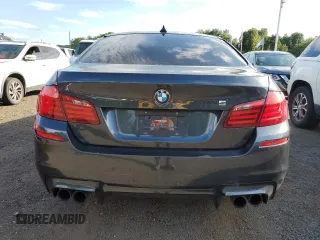 2013 BMW M5 with VIN WBSFV9C5XDD096847, listed as a Copart auction lot 69652454 with 73,632 mi miles and Clean Title. Bid and sale history available at carsss.com. Image 6.