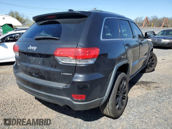 2014 Jeep Grand Cherokee Laredo with VIN 1C4RJFAG4EC210321, listed as a Copart auction lot 53574595 with 119,650 mi miles and Salvage Title. Bid and sale history available at DreamBid. Image 3.