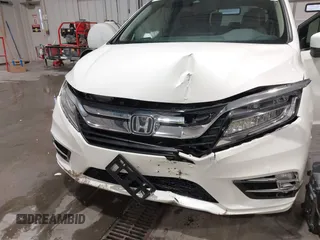 2019 Honda Odyssey Touring with VIN 5FNRL6H83KB051363, listed as a IAAI auction lot 41173587 with 88,512 mi miles. Bid and sale history available at carsss.com. Image 6.