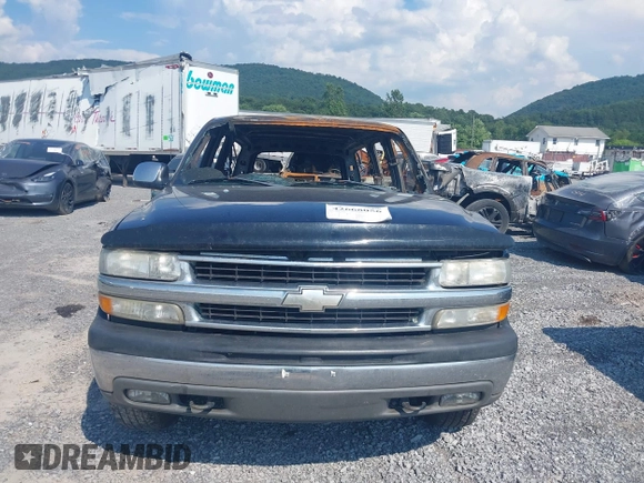 2002 Chevrolet Suburban LT z VIN 1GNFK16Z82J207479, wystawiony jako IAAI lot #42668056 z przebiegiem 140 000 mil mil oraz . Historia ofert i sprzedaży dostępna na DreamBid. Obrazek 6.