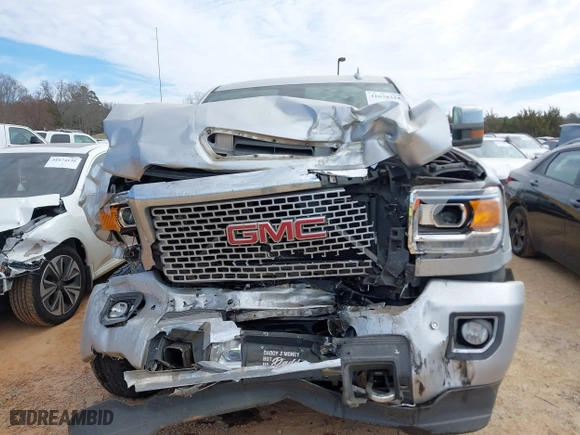2017 GMC Sierra 2500HD Denali with VIN 1GT12UEY8HF216479, listed as a IAAI auction lot 41678315 with 127,057 mi miles. Bid and sale history available at carsss.com. Image 12.