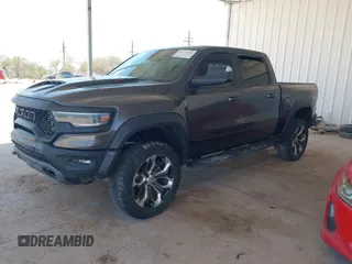 2022 Ram 1500 TRX with VIN 1C6SRFU97NN353587, listed as a IAAI auction lot 42174702 with 35,305 mi miles and . Bid and sale history available at DreamBid. Image 2.