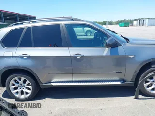 2011 BMW X5 35i z VIN 5UXZV4C57BL410981, wystawiony jako IAAI lot #42126240 z przebiegiem 160 473 mil mil oraz . Historia ofert i sprzedaży dostępna na DreamBid. Obrazek 13.