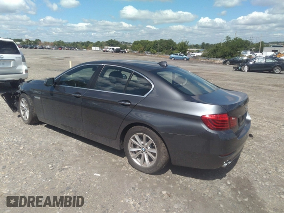 2015 BMW 5 Series 528i xDrive with VIN WBA5A7C55FD628489, listed as a IAAI auction lot 39752634 with 74,792 mi miles and . Bid and sale history available at carsss.com. Image 3.