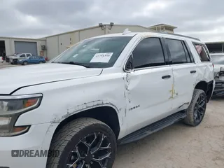 2015 Chevrolet Tahoe LT with VIN 1GNSCBKC4FR530776, listed as a IAAI auction lot 41754350 with 174,694 mi miles and . Bid and sale history available at DreamBid. Image 6.