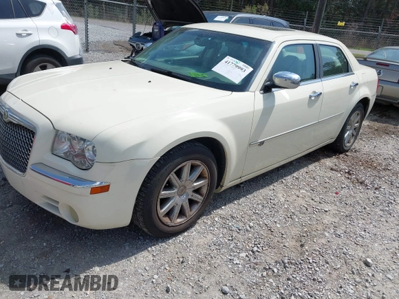 2010 Chrysler 300 C Hemi with VIN 2C3CA6CT6AH114461, listed as a IAAI auction lot 41779993 with 126,898 mi miles and . Bid and sale history available at carsss.com. Image 2.