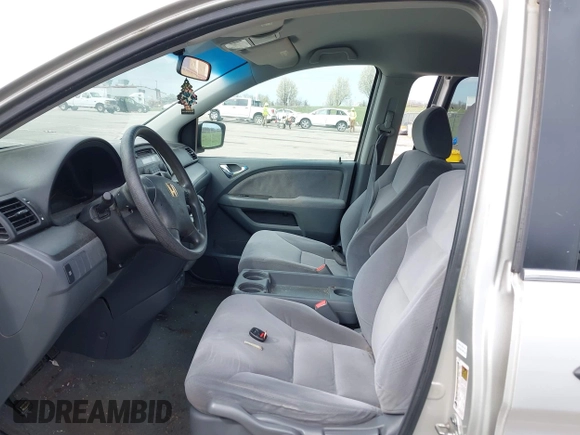 2007 Honda Odyssey LX z VIN 5FNRL38297B073742, wystawiony jako IAAI lot #41919129 z przebiegiem 152 584 mil mil oraz . Historia ofert i sprzedaży dostępna na DreamBid. Obrazek 5.