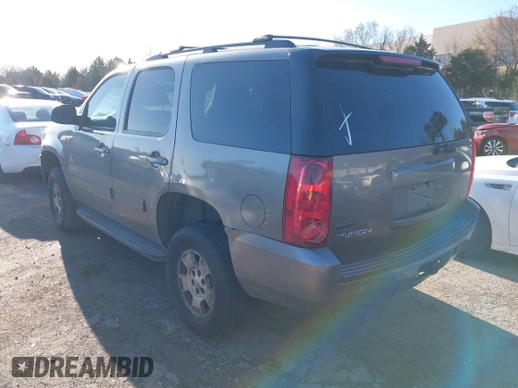 2012 GMC Yukon SLE with VIN 1GKS1AE06CR218372, listed as a IAAI auction lot 41591288 with 166,596 mi miles. Bid and sale history available at carsss.com. Image 3.
