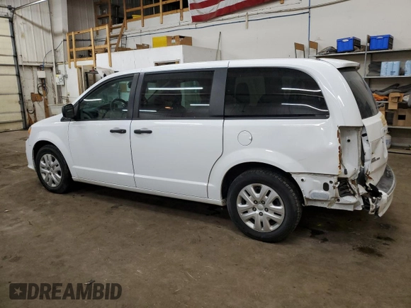 2020 Dodge Grand Caravan SE with VIN 2C4RDGBG0LR196885, listed as a Copart auction lot 43585545 with 124,942 mi miles and Salvage Title. Bid and sale history available at DreamBid. Image 2.