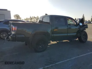 2021 Toyota Tacoma SR5 z VIN 3TMAZ5CN6MM157145, wystawiony jako Copart lot #51641085 z przebiegiem Nie podano mil oraz Szkoda całkowita • Salvage title. Historia ofert i sprzedaży dostępna na DreamBid. Obrazek 3.