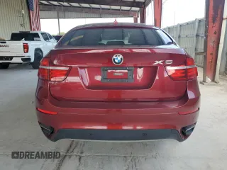 2014 BMW X6 50i z VIN 5UXFG8C58EL592408, wystawiony jako Copart lot #58175225 z przebiegiem 119 939 mil mil oraz Czysty tytuł • Clean title. Historia ofert i sprzedaży dostępna na DreamBid. Obrazek 6.