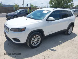 2021 Jeep Cherokee Latitude with VIN 1C4PJMCB1MD171158, listed as a IAAI auction lot 42259802 with 136,987 mi miles and . Bid and sale history available at DreamBid. Image 2.