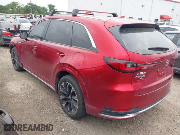 2024 Mazda CX-90 S z VIN JM3KK1HC2R1133087, wystawiony jako IAAI lot #41955750 z przebiegiem 24 217 mil mil oraz . Historia ofert i sprzedaży dostępna na DreamBid. Obrazek 3.