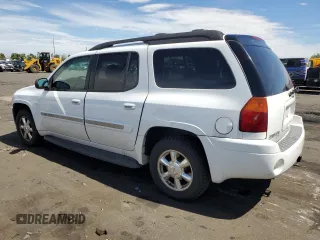 2005 GMC Envoy SLT with VIN 1GKET16M156182653, listed as a Copart auction lot 68747784 with 306,802 mi miles and Salvage Title. Bid and sale history available at DreamBid. Image 2.