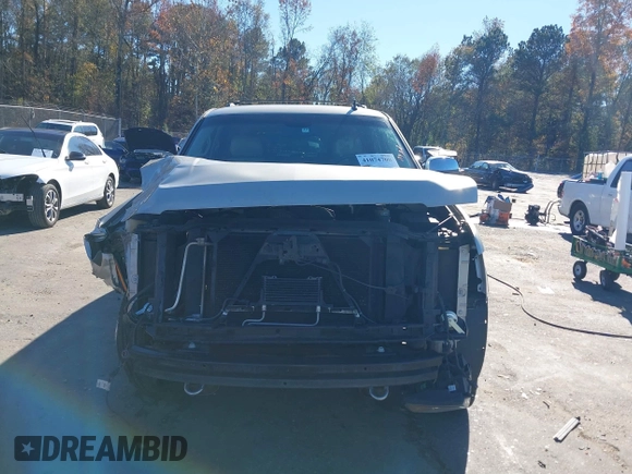 2013 Chevrolet Tahoe LT z VIN 1GNSCBE05DR378859, wystawiony jako IAAI lot #41074700 z przebiegiem 184 925 mil mil oraz . Historia ofert i sprzedaży dostępna na DreamBid. Obrazek 13.
