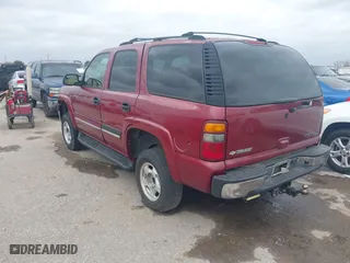 2004 Chevrolet Tahoe LT with VIN 1GNEC13Z34J203100, listed as a IAAI auction lot 41749196 with 188,416 mi miles. Bid and sale history available at carsss.com. Image 3.