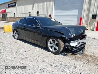 2016 BMW 4 Series 428i with VIN WBA3N7C55GK227677, listed as a IAAI auction lot 42048025 with 82,078 mi miles and . Bid and sale history available at carsss.com. Image 1.