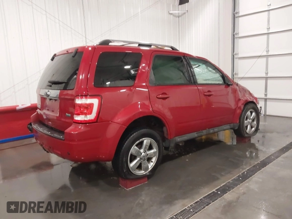 2011 Ford Escape Limited with VIN 1FMCU9EG0BKB84077, listed as a IAAI auction lot 41677063 with 93,860 mi miles. Bid and sale history available at carsss.com. Image 4.