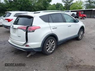2016 Toyota RAV4 Limited with VIN 2T3YFREV6GW293418, listed as a IAAI auction lot 42367428 with 210,000 mi miles and . Bid and sale history available at DreamBid. Image 4.